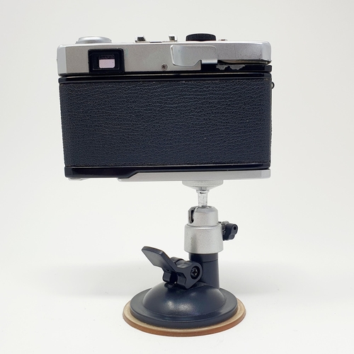 15 - An Olympus 35 RC camera, with a stand
Provenance: From a single owner collection