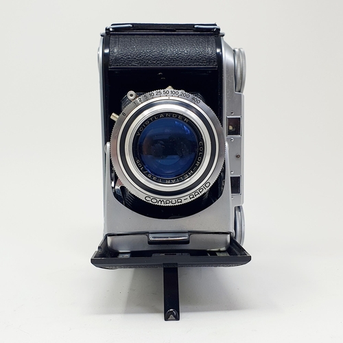 22 - A Voightlander Bessa II bellows camera, with a copy of its original manual
Provenance: From a single... 