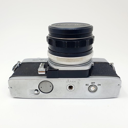 3 - A Minolta SRT101 camera and lens