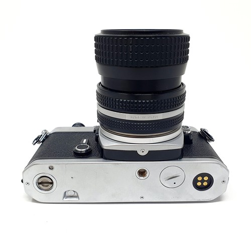 18 - A Kodak Retina Auto II camera, a Minox 35GL camera, and a Nikon camera with manual, No FE3229137 (3)... 