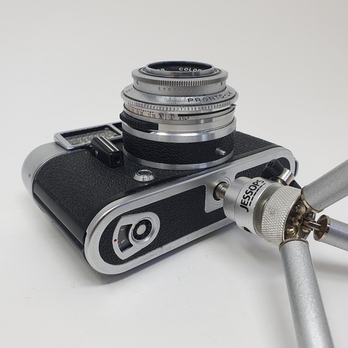 23 - A Voigtlander Vito B camera, and a Voigtlander Vito CLR camera, with a stand
Provenance: From a sing... 
