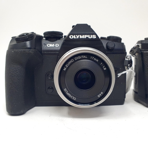 16 - An Olympus OM-D E-M5 II camera and an Olympus OM-D E-M1 II camera (2) 
Provenance: From a single own... 