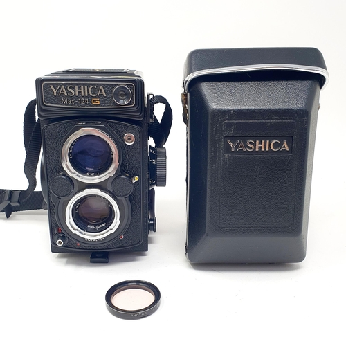 20 - A Yashica Mat-124 G twin lens camera, in a carry case
Provenance: From a single owner collection