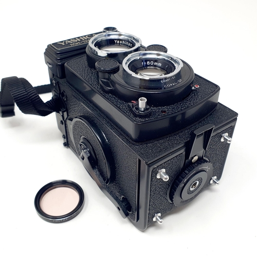 20 - A Yashica Mat-124 G twin lens camera, in a carry case
Provenance: From a single owner collection