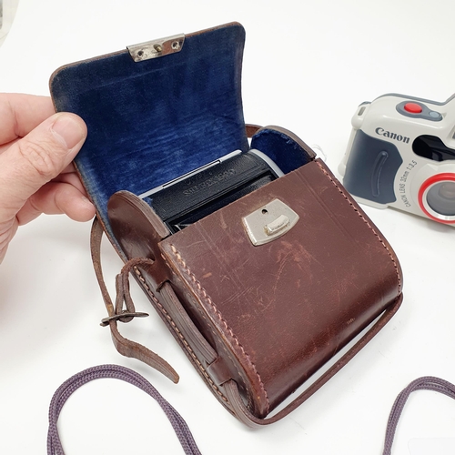 31 - An Ensign Selfix 16-20 camera, in a leather carry case, an Ensign Weston Master III light meter in l... 