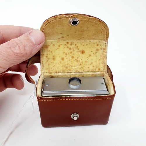 35 - A Mayima 16 miniature camera, in a leather case Provenance: From a single owner collection