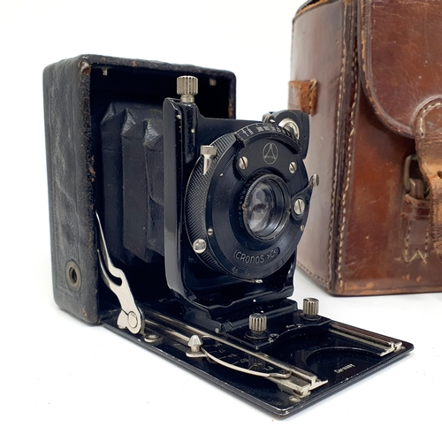 44 - A Cronos C4 camera, in leather case, a Ensign Selfix 16-20 camera, and a leather carry case (3)
Prov... 