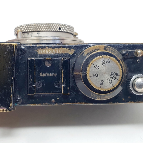 45 - A Leica 1 camera, No. 52140, in part leather case with an Elmar F=50mm 1:3.5 lens
Provenance: From a... 