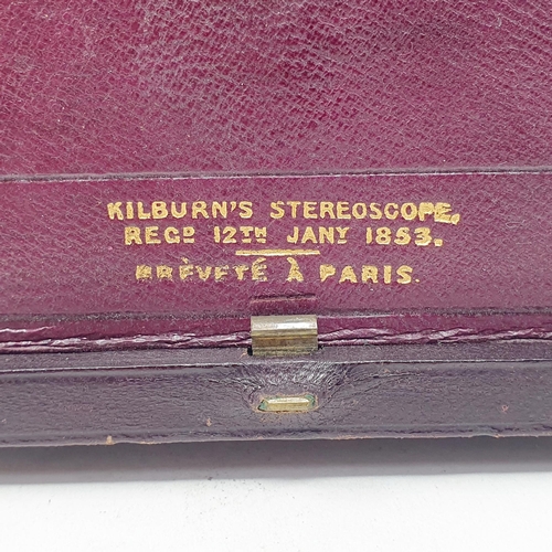 58 - A Victorian stereoscopic daguerreotype viewer, the leather case with a retail  mark for Mr Kilburn, ... 