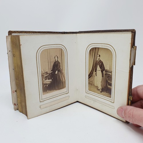 88 - An early 20th century leather bound photograph album, and assorted early 20th century photographs, s... 