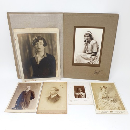 88 - An early 20th century leather bound photograph album, and assorted early 20th century photographs, s... 