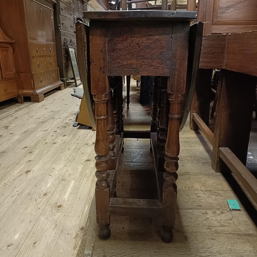 919 - A 19th century oak gateleg table, 100 cm wide