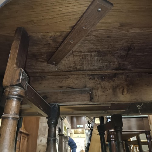 919 - A 19th century oak gateleg table, 100 cm wide