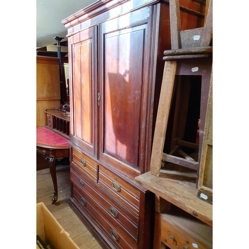 851 - A walnut linen press, 128 cm wide