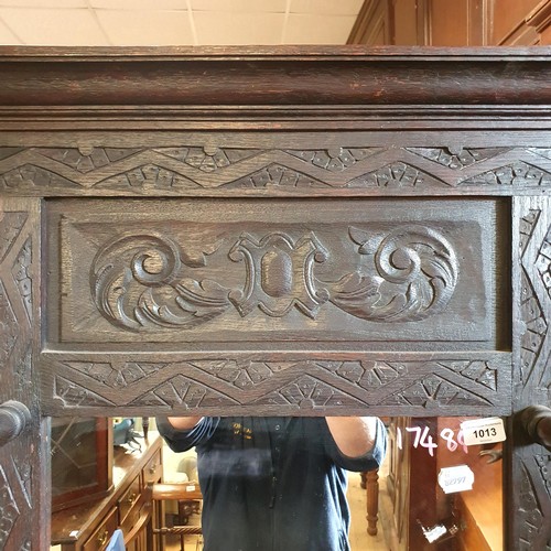 856 - A late Victorian carved oak hall stand, 115 cm wide