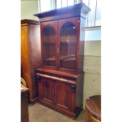 878 - A Victorian mahogany bookcase on cabinet, 110 cm wide