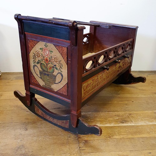 942 - A German painted cot, 97 cm wide