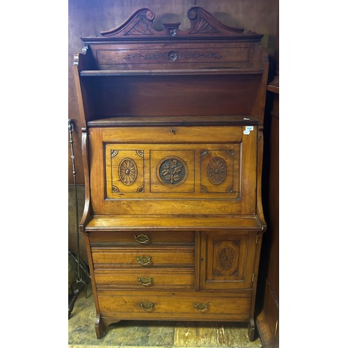 908 - An early 20th century walnut upright desk, 95 cm wide