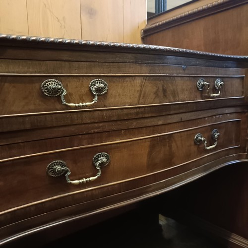 923 - An Edwardian mahogany sideboard, with two central drawers, flanked by a drawer and a cupboard, 198 c... 