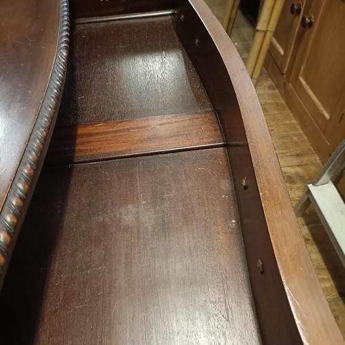 923 - An Edwardian mahogany sideboard, with two central drawers, flanked by a drawer and a cupboard, 198 c... 