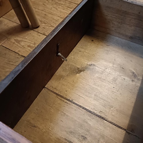 867 - An 18th century oak mule chest, the base with three drawers, 140 cm wide