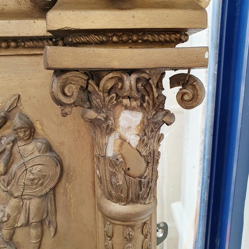 944 - A Regency style gilt framed overmantel mirror, with a classical frieze, 90 x 140 cm