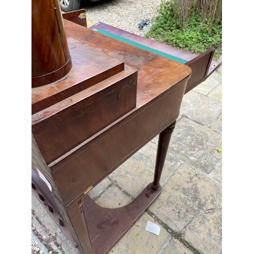 1009 - A 19th century Continental dressing table, the superstructure having two cupboard doors and two draw... 