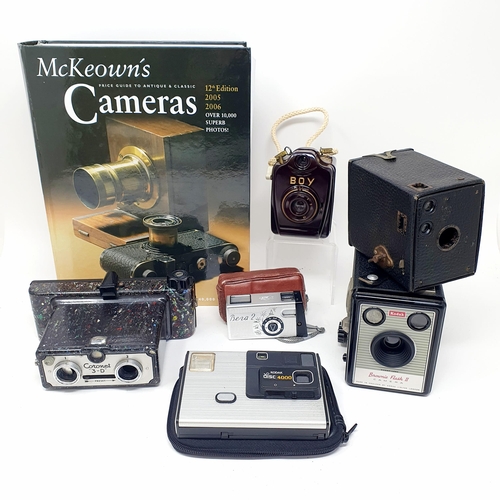 100 - A Kodak Brownie Flash II camera, McKeown's cameras 12th edition, a Coronet Stereo Camera, a Kive min... 