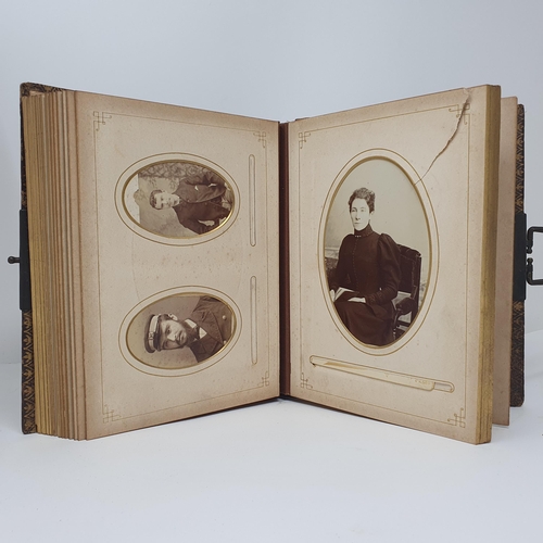 104 - A daguerreotype portrait of a woman, another, assorted magic lantern slides, and three early 20th ce... 