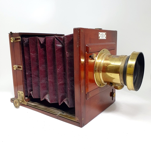 93 - An early 20th century mahogany and brass plate camera, by J R Robinson & Sons, 172 Regent Street, Lo... 