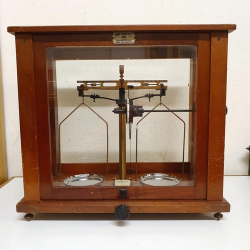 109 - A set of laboratory scales, 46 cm wide