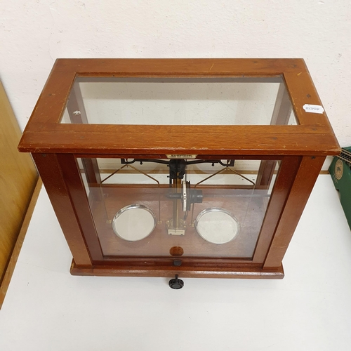 109 - A set of laboratory scales, 46 cm wide