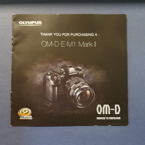 11 - An Olympus OM-D E-M1X digital camera, and manual
Provenance: From a single owner collection