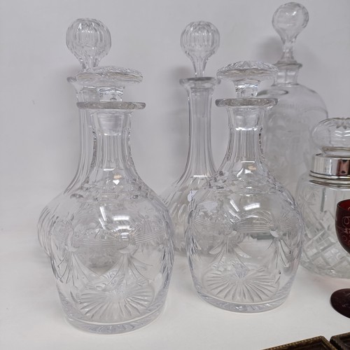 701 - A decanter, engraved CIII, 27 cm high, five other decanters, two glasses, and two Stevenographs (qty... 