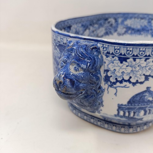 712 - A blue and white tureen, with lion mask handles, 34 cm wide