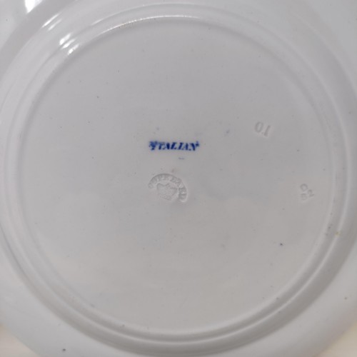 713 - A blue and white plate, decorated a landscape, 25 cm diameter, and three others (4)