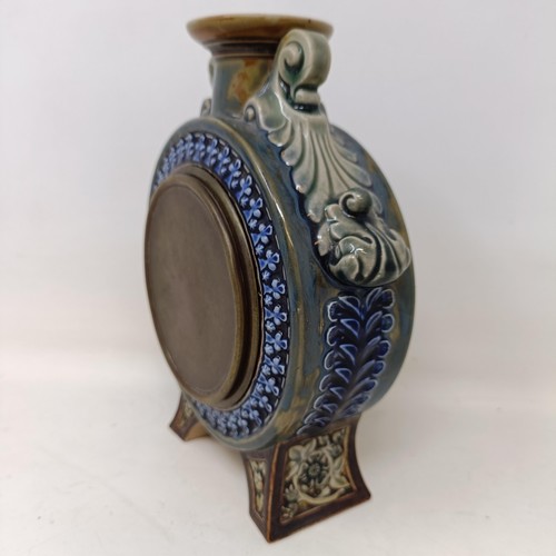 716 - A Doulton Lambeth mantel clock, in the form of a vase, possibly lacking finial, 20 cm high