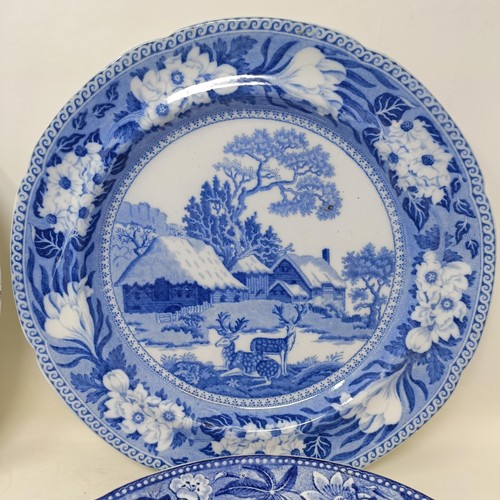 717 - A blue and white plate decorated cows, 25 cm diameter and five others similar (6)