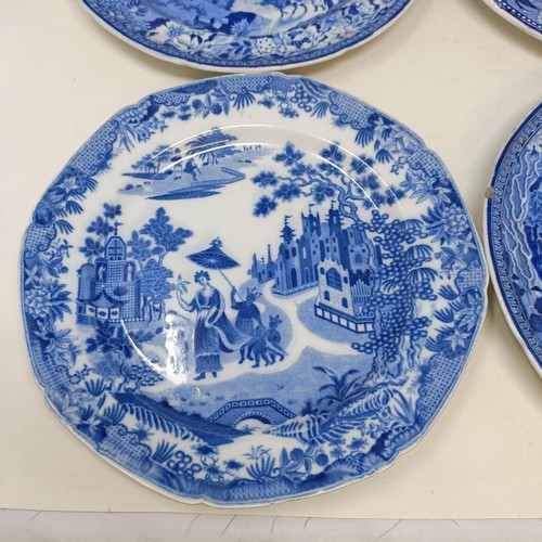 717 - A blue and white plate decorated cows, 25 cm diameter and five others similar (6)