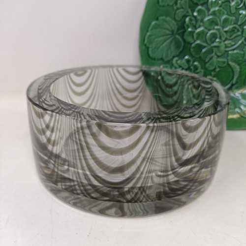 720 - An Art Glass vase, and a green glazed leaf plate (2)