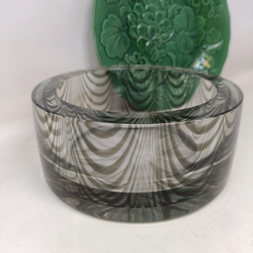 720 - An Art Glass vase, and a green glazed leaf plate (2)