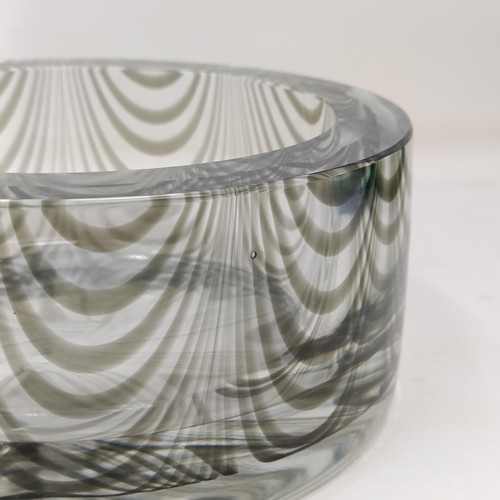 720 - An Art Glass vase, and a green glazed leaf plate (2)