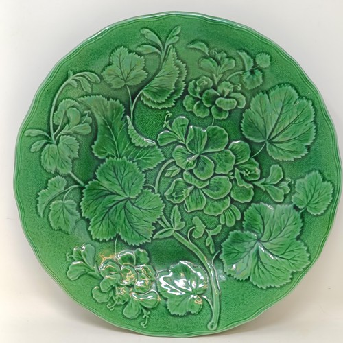 720 - An Art Glass vase, and a green glazed leaf plate (2)