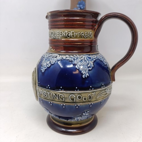 723 - A Doulton Lambeth commemorative jug, 20 cm high and a Doulton vase (2)