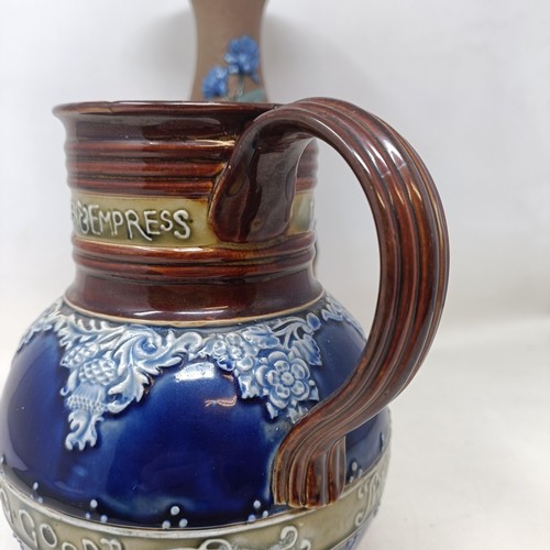 723 - A Doulton Lambeth commemorative jug, 20 cm high and a Doulton vase (2)