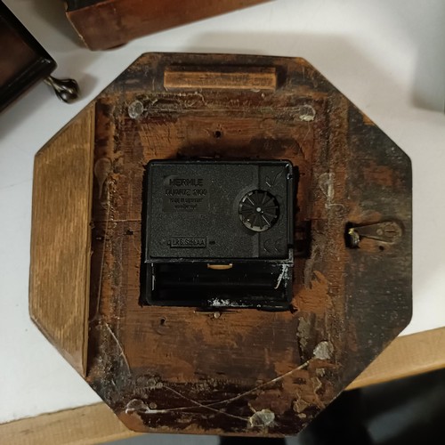 734 - A mahogany tea caddy, 23 cm wide, a clock and four boxes (6)