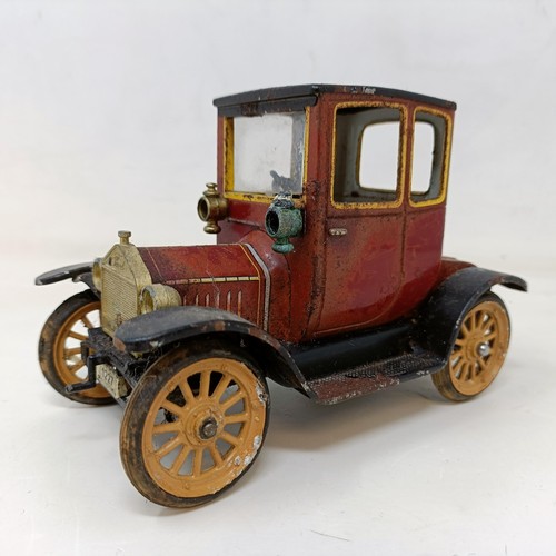 208 - A Schuco clockwork vintage car, No 12277