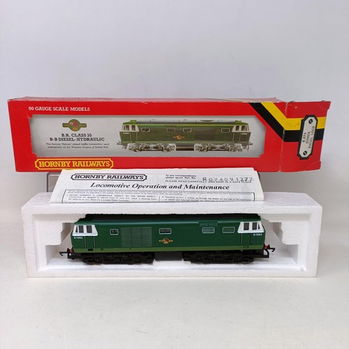 212 - A Hornby OO gauge 4-0-4 locomotive and trailer No. R157, R074, R761, R052 and R041, all boxed, and a... 