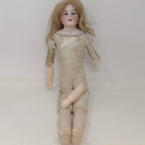 219 - A German bisque headed doll with closing millefiori eyes, and a leather and bisque jointed body, 42 ... 