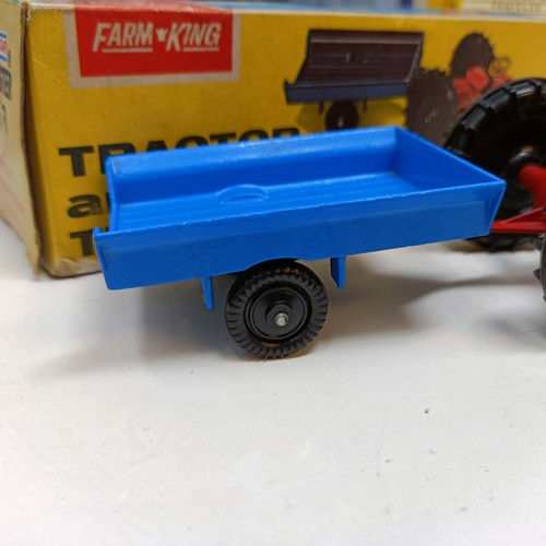 230 - A Farm King model tractor No. 1258 boxed, a Vanguard model, No. VA14011 and VA11009 and assorted toy... 